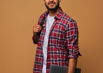 Student Holding a laptoo - DM